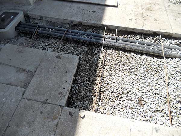 Cast Iron Piping Goes Under the Sidewalk